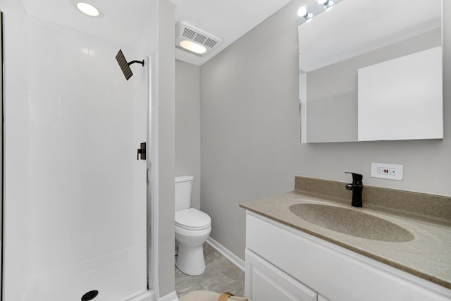 bathroom with a shower, vanity, and toilet