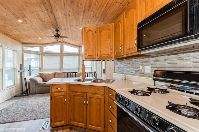 kitchen with wood ceiling, white range with gas cooktop, sink, light hardwood / wood-style floors, and lofted ceiling