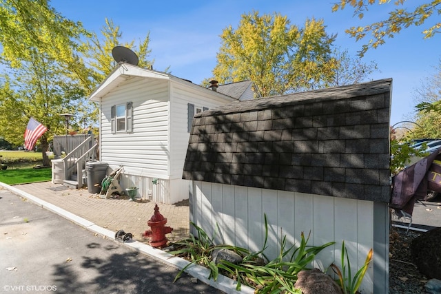 184 Eon Ln, Wilmington, IL 60481 - view of property exterior featuring roof with shingles