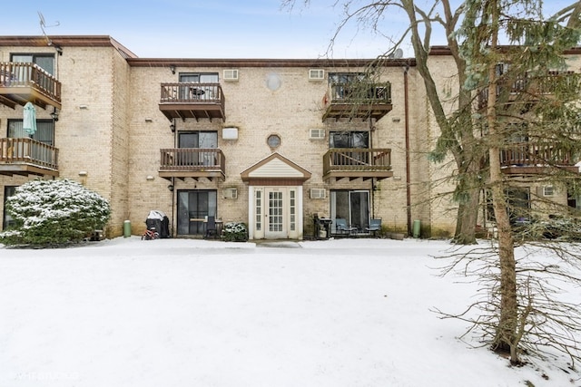 view of snow covered property