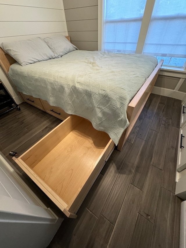 bedroom featuring dark hardwood / wood-style floors