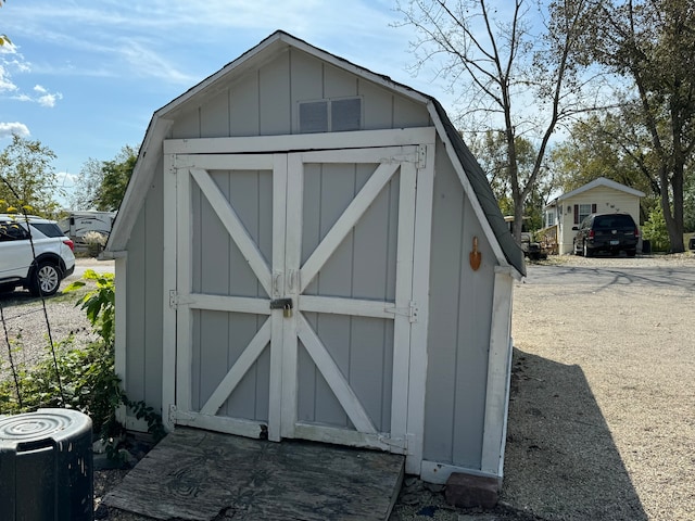 view of outbuilding with central AC