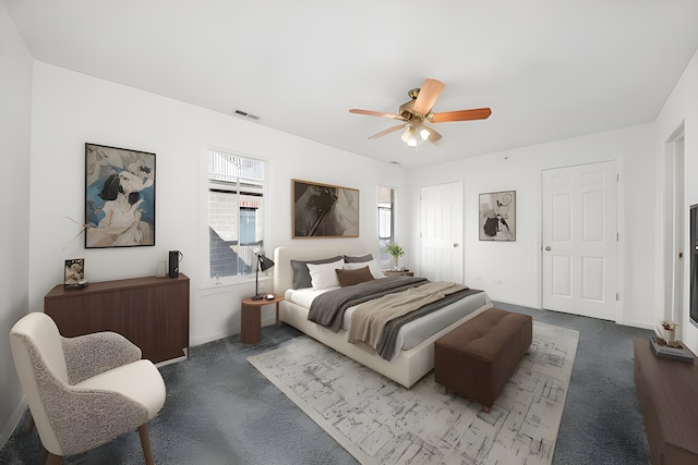 carpeted bedroom featuring ceiling fan