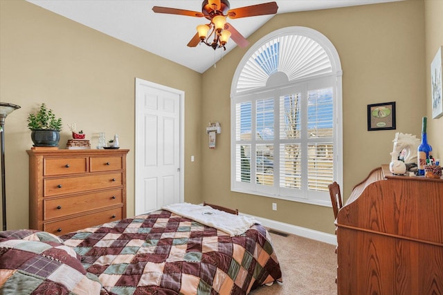 bedroom featuring visible vents, baseboards, lofted ceiling, ceiling fan, and carpet flooring