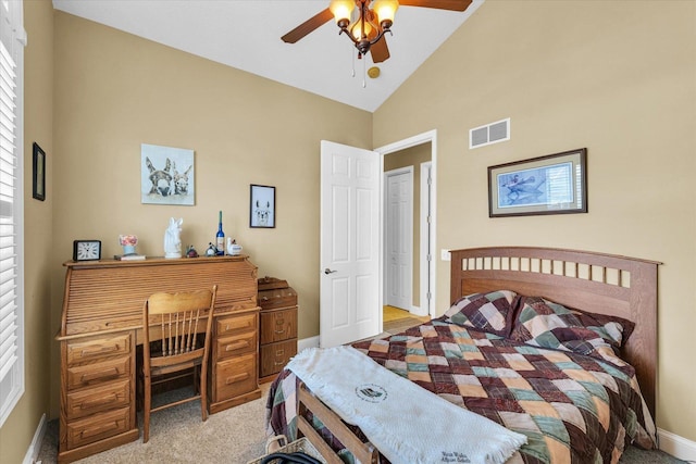 bedroom with visible vents, baseboards, lofted ceiling, ceiling fan, and light colored carpet