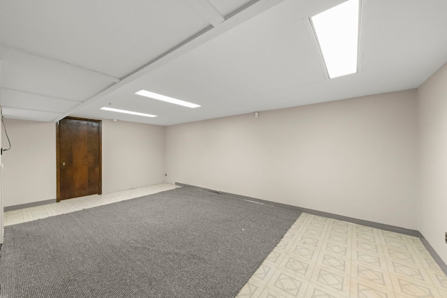 basement with light colored carpet