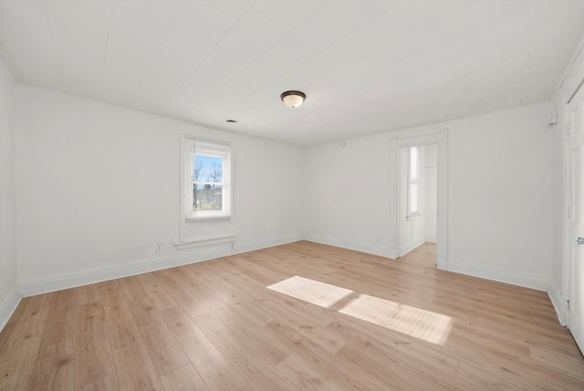 unfurnished room featuring light hardwood / wood-style flooring