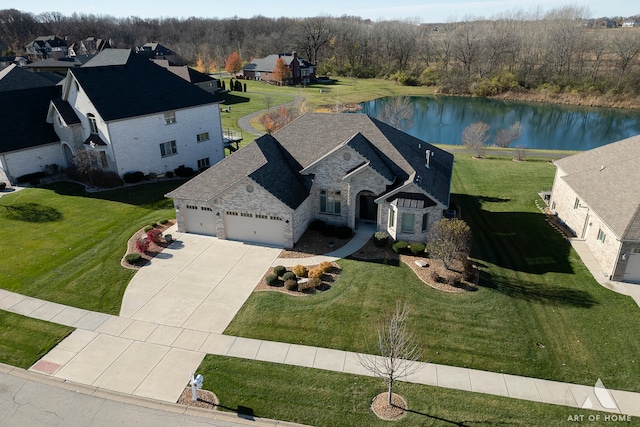 drone / aerial view with a water view