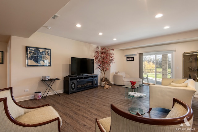 living room featuring dark hardwood / wood-style floors