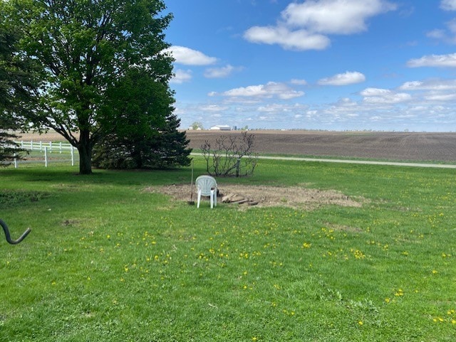 1522 E 7th Rd, Lostant, IL 61334 - view of yard featuring a rural view and fence