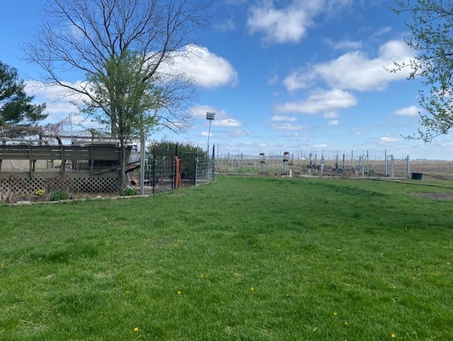 1522 E 7th Rd, Lostant, IL 61334 - view of yard with a wooden deck and fence