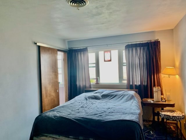 1522 E 7th Rd, Lostant, IL 61334 - bedroom featuring visible vents