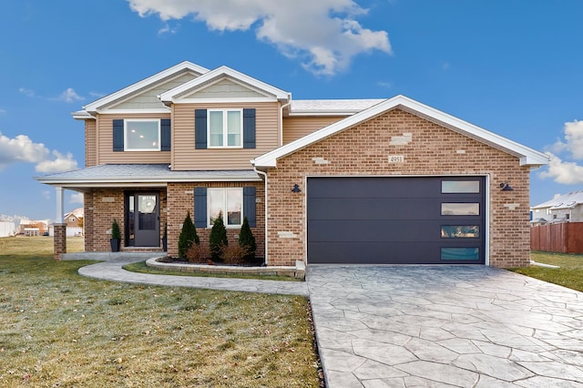 view of front of house with a garage and a front lawn