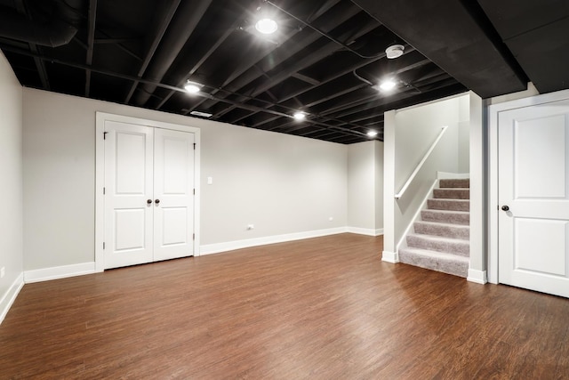 basement featuring wood-type flooring