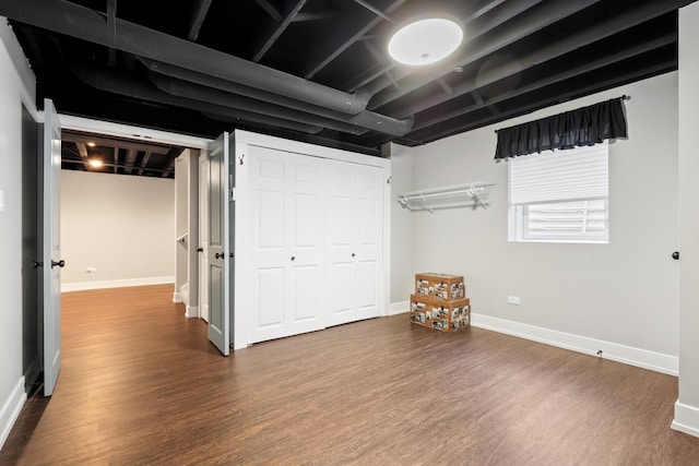 basement featuring hardwood / wood-style flooring