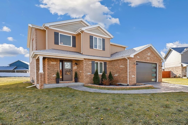 view of front of property with a front yard and a garage