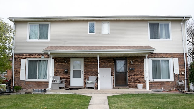 view of front of home with a front yard