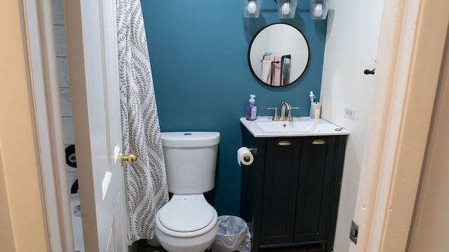 bathroom with vanity and toilet