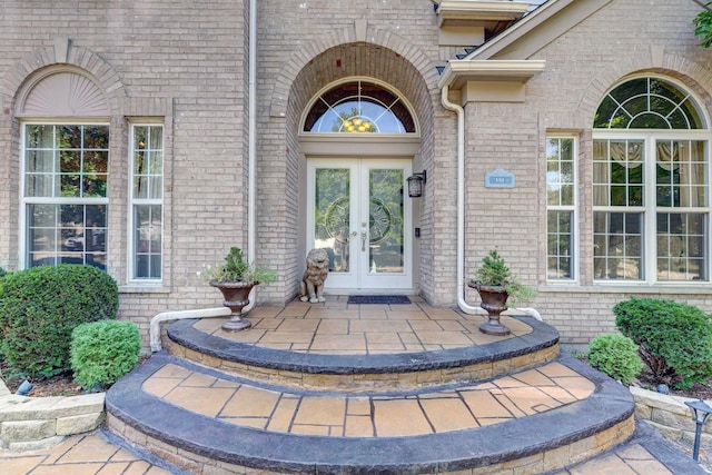 entrance to property featuring french doors