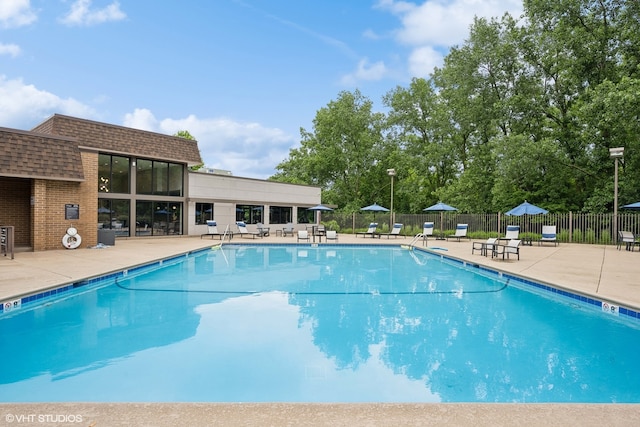 view of swimming pool featuring a patio