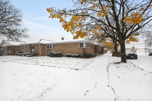 view of snow covered property