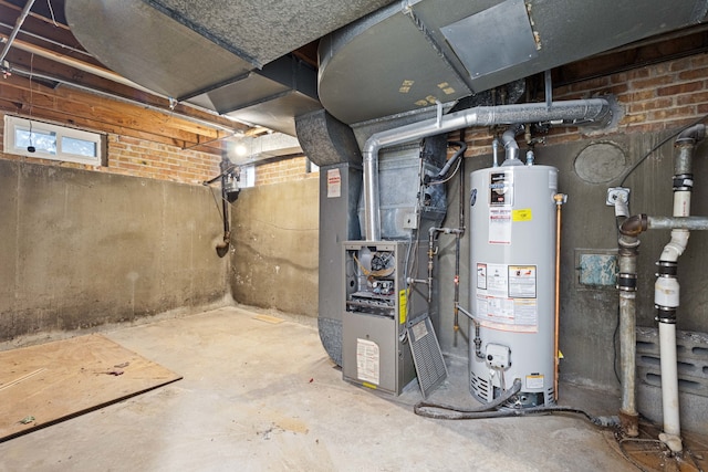 utility room featuring heating unit and water heater