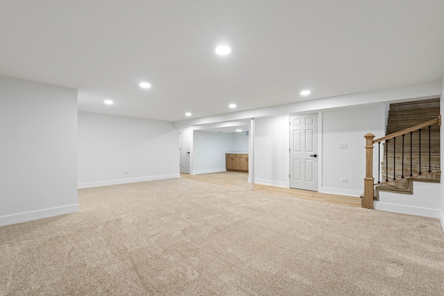 basement with light carpet