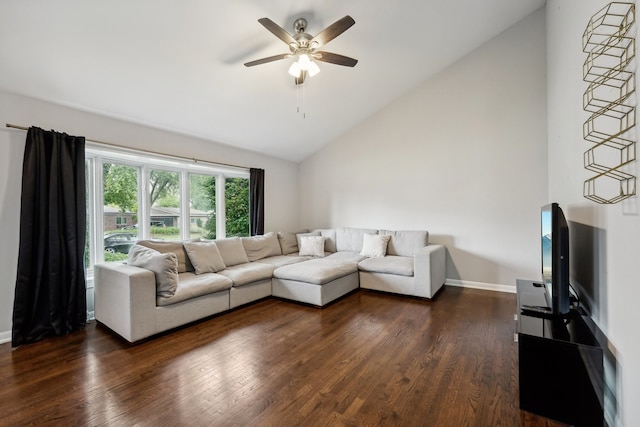 living room featuring dark hardwood / wood-style floors, high vaulted ceiling, and ceiling fan