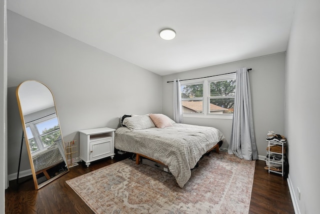 bedroom featuring dark hardwood / wood-style floors