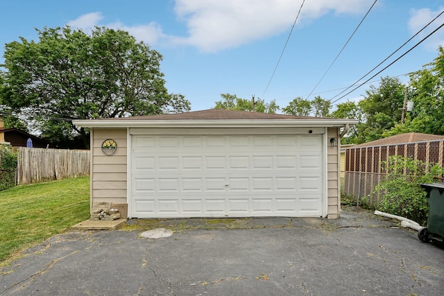 garage with a yard