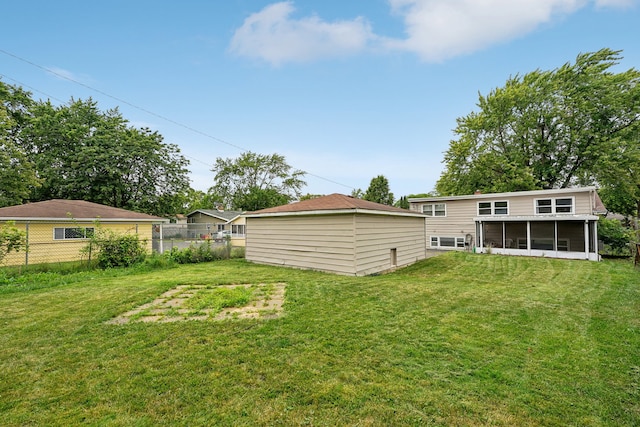 view of yard with a sunroom