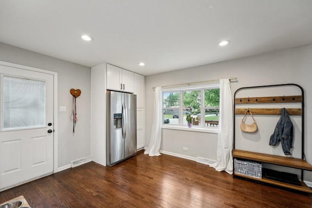 foyer featuring dark wood-type flooring