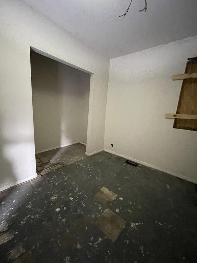 6922 S Lowe Ave, Chicago, IL 60621 - unfurnished bedroom featuring baseboards and a closet