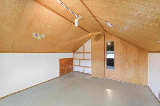 additional living space with lofted ceiling and wood ceiling