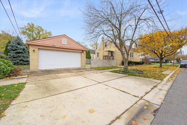 view of front of house featuring an outbuilding and a garage