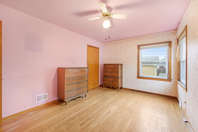 bedroom featuring ceiling fan and light hardwood / wood-style flooring