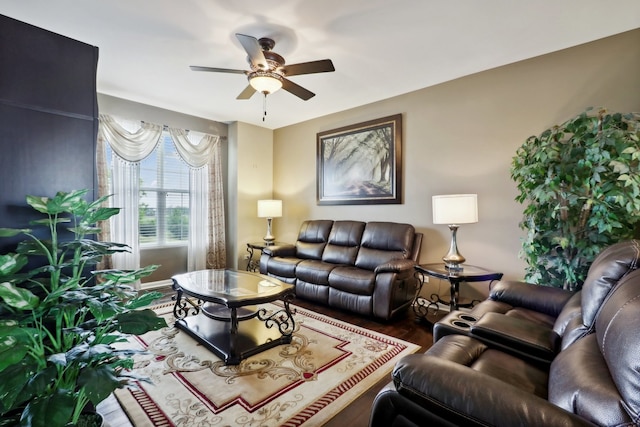 living room with hardwood / wood-style floors and ceiling fan