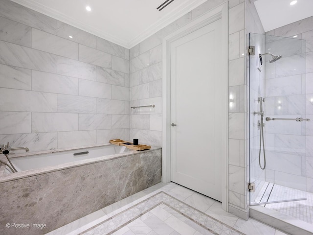 bathroom with ornamental molding, plus walk in shower, and tile walls