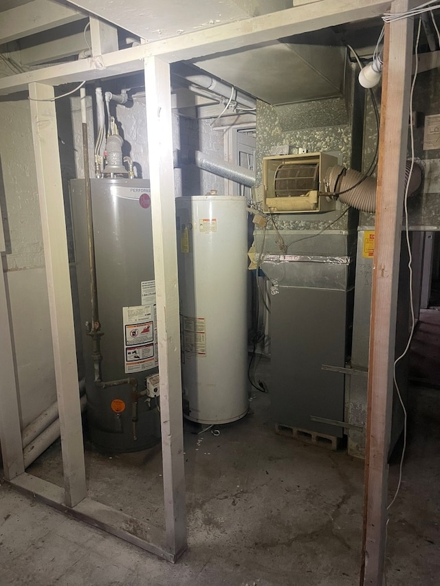 utility room with water heater