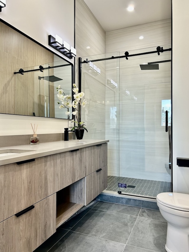 bathroom featuring vanity, toilet, and walk in shower