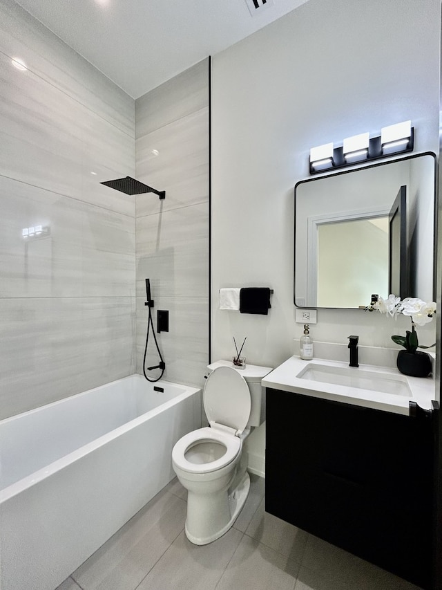 full bathroom with vanity, tile patterned floors, washtub / shower combination, and toilet