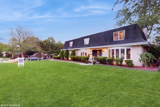 view of front of house with a front yard