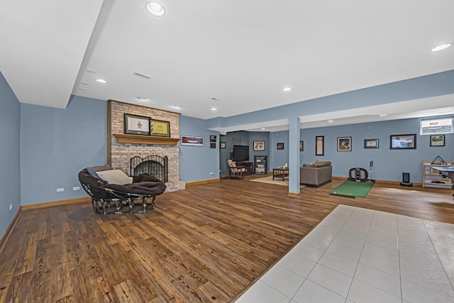 unfurnished living room with light hardwood / wood-style flooring and a fireplace