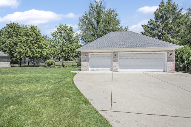 garage with a yard