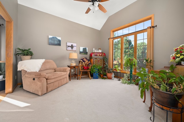 game room featuring ceiling fan, carpet floors, and vaulted ceiling