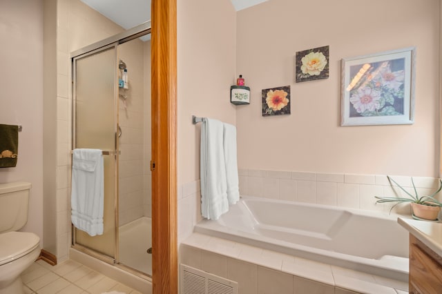 full bathroom featuring tile patterned flooring, vanity, toilet, and independent shower and bath