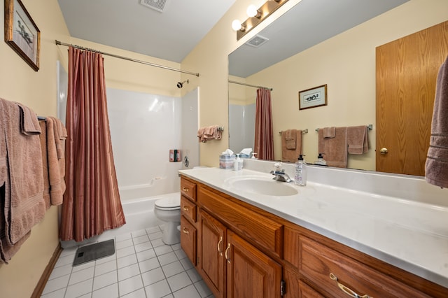 full bathroom featuring tile patterned floors, shower / bath combo, toilet, and vanity