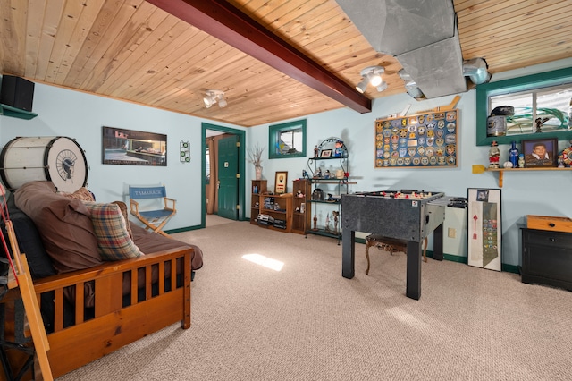 rec room with carpet, beam ceiling, and wood ceiling