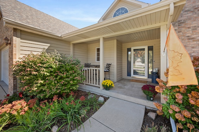 entrance to property with a porch