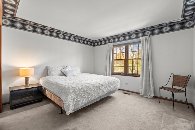 bedroom featuring carpet